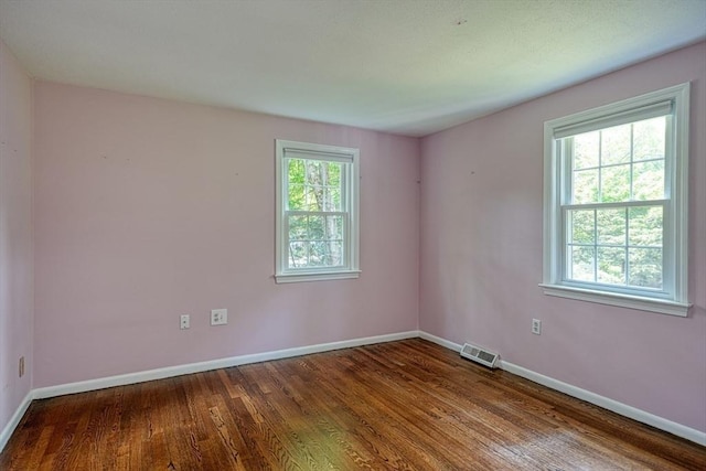 216 Davis St, Northborough, MA 01532 - unfurnished room featuring baseboards and wood finished floors