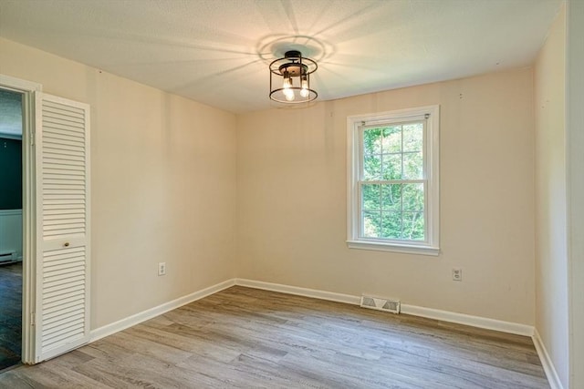 216 Davis St, Northborough, MA 01532 - unfurnished room featuring wood finished floors and baseboards