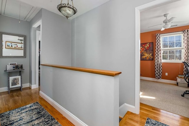 hallway featuring hardwood / wood-style flooring