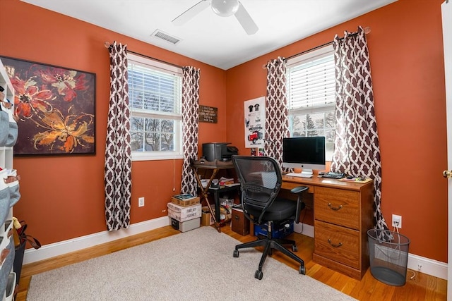 office space featuring hardwood / wood-style flooring and ceiling fan