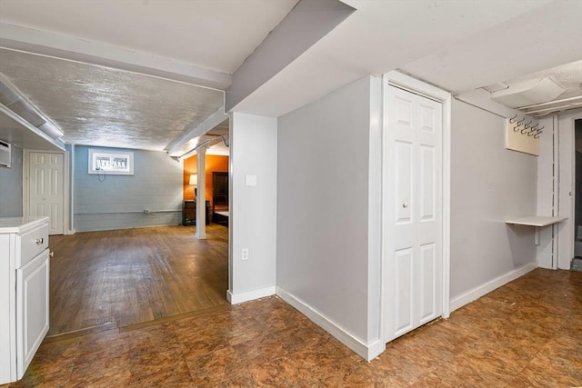 additional living space featuring hardwood / wood-style floors