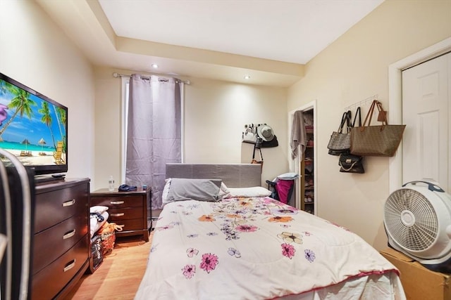 bedroom featuring recessed lighting and light wood finished floors