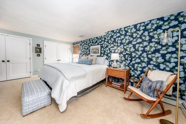 bedroom featuring light colored carpet