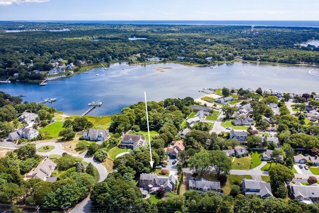 birds eye view of property featuring a water view