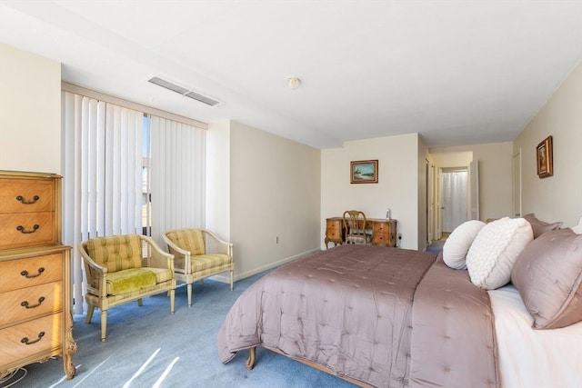 carpeted bedroom with baseboards and visible vents