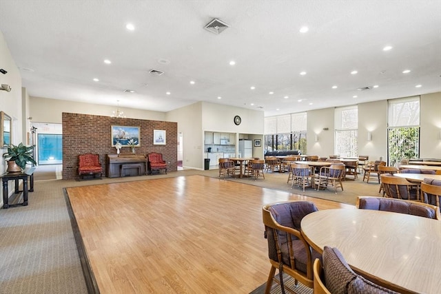 dining space featuring plenty of natural light, recessed lighting, and visible vents