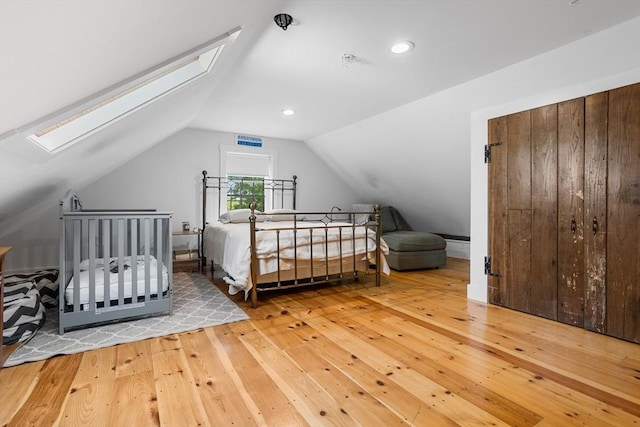 166 Littleton Unit 3, Harvard, MA 01451 - bedroom with a skylight, wood-type flooring, lofted ceiling, and recessed lighting