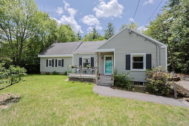 239 Highland St, Lunenburg, MA 01462 - view of front of house with a front lawn and roof with shingles