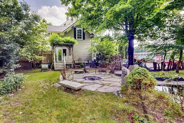 239 Arlington St, Acton, MA 01720 - back of house featuring a patio area