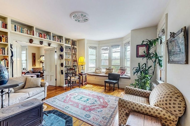 239 Arlington St, Acton, MA 01720 - living area featuring plenty of natural light and hardwood / wood-style flooring