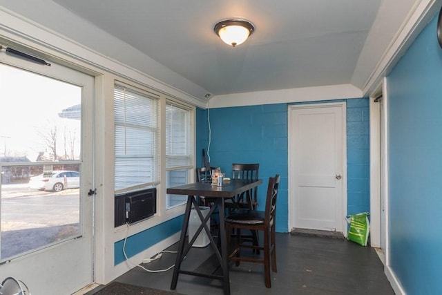 dining area with dark wood-type flooring