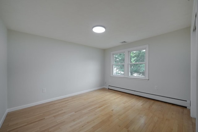 5 Betsy Ln Unit 5, Chelmsford, MA 01824 - unfurnished room with baseboard heating and light wood-style flooring