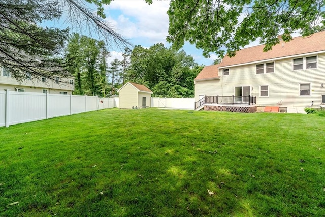 5 Betsy Ln Unit 5, Chelmsford, MA 01824 - fenced backyard featuring a wooden deck and a shed