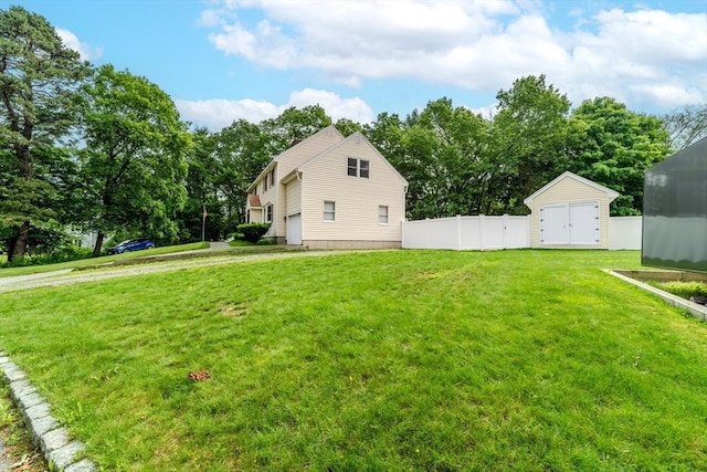 5 Betsy Ln Unit 5, Chelmsford, MA 01824 - view of side of home with a storage unit and view of scattered trees