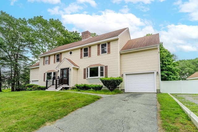 5 Betsy Ln Unit 5, Chelmsford, MA 01824 - colonial house featuring driveway, a chimney, and an attached garage