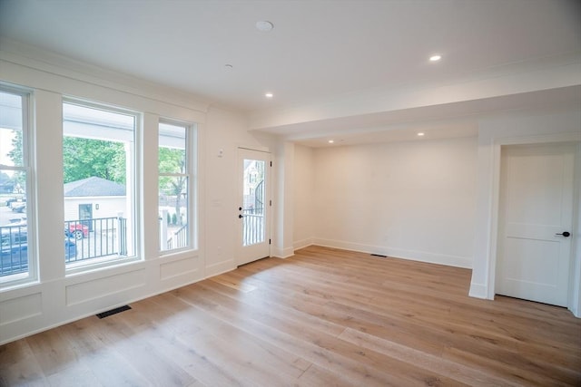 182 Merrimac St Unit 1, Newburyport, MA 01950 - unfurnished room featuring healthy amount of natural light, light wood finished floors, crown molding, and recessed lighting
