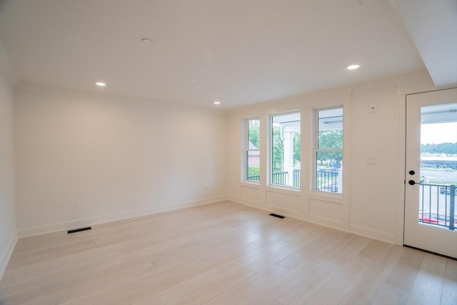 182 Merrimac St Unit 1, Newburyport, MA 01950 - unfurnished room featuring healthy amount of natural light, light wood-style flooring, and recessed lighting