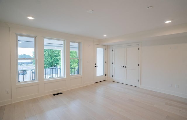 182 Merrimac St Unit 1, Newburyport, MA 01950 - empty room with light wood-style flooring, healthy amount of natural light, and recessed lighting
