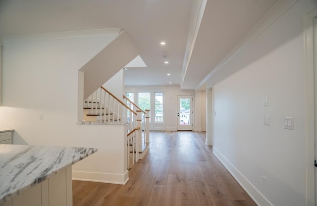 182 Merrimac St Unit 1, Newburyport, MA 01950 - corridor featuring stairs, light wood-type flooring, and recessed lighting