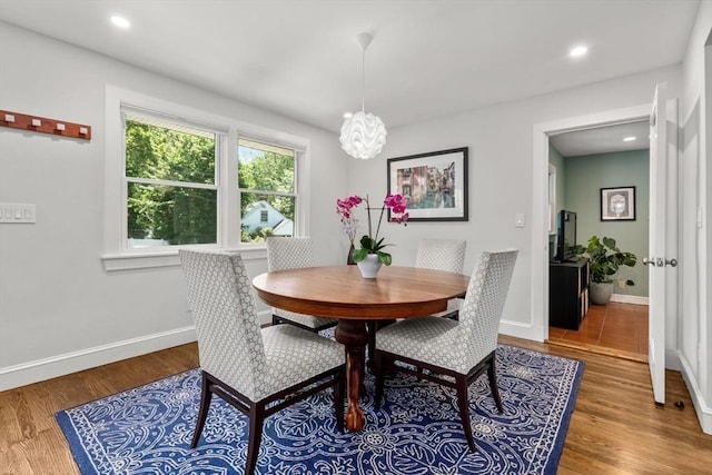 57 Glenham St, Boston, MA 02132 - dining area with wood finished floors, a chandelier, and recessed lighting