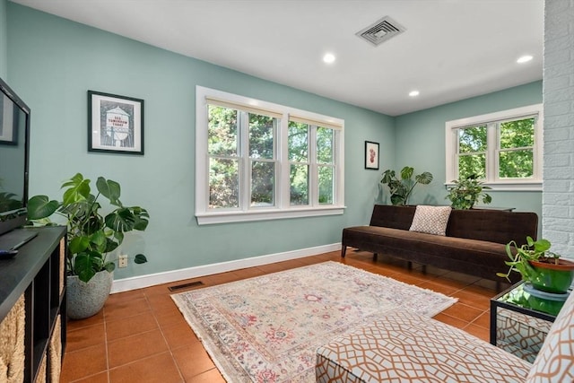 57 Glenham St, Boston, MA 02132 - living area with plenty of natural light, recessed lighting, and tile patterned floors