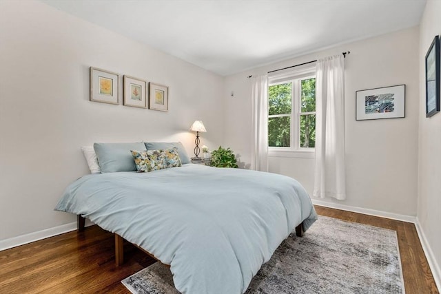 57 Glenham St, Boston, MA 02132 - bedroom featuring baseboards and wood finished floors