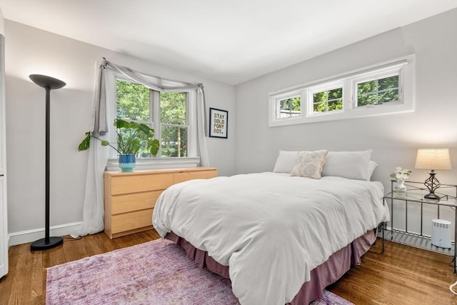 57 Glenham St, Boston, MA 02132 - bedroom featuring multiple windows and wood finished floors