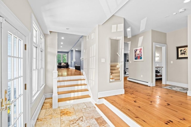 148 Pond St, Cohasset, MA 02025 - foyer entrance featuring baseboard heating, stairs, baseboards, recessed lighting, and wood finished floors