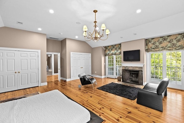 148 Pond St, Cohasset, MA 02025 - living area featuring lofted ceiling, a chandelier, recessed lighting, baseboards, and light wood-style flooring