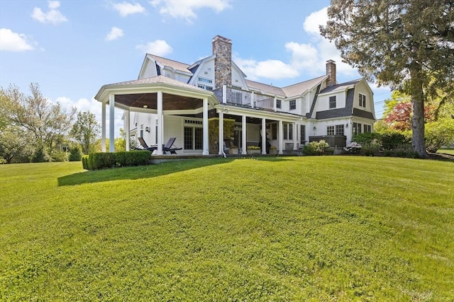 148 Pond St, Cohasset, MA 02025 - rear view of property with a gambrel roof, a yard, and a chimney