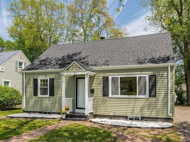 76 Wolcott Ave, West Springfield, MA 01089 - cape cod home featuring a shingled roof and a front yard