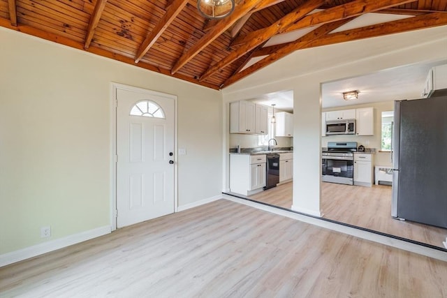 76 Wolcott Ave, West Springfield, MA 01089 - entrance foyer featuring light wood-style floors, wood ceiling with exposed beams, baseboards, and high vaulted ceiling