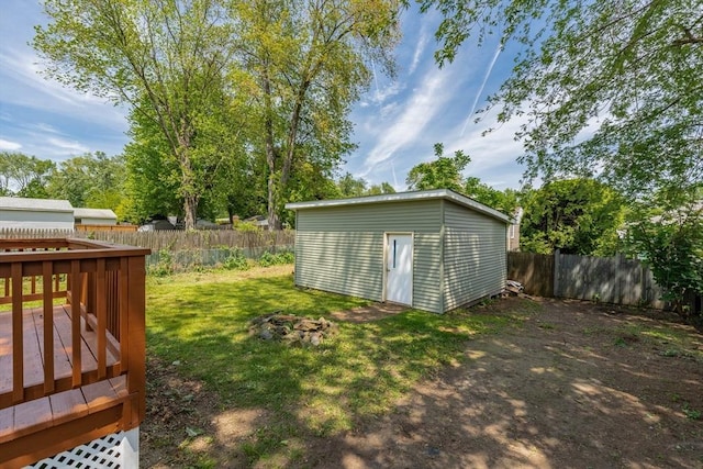 76 Wolcott Ave, West Springfield, MA 01089 - view of yard featuring a wooden deck and an outdoor structure