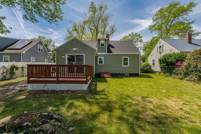 76 Wolcott Ave, West Springfield, MA 01089 - back of property featuring a wooden deck and a chimney