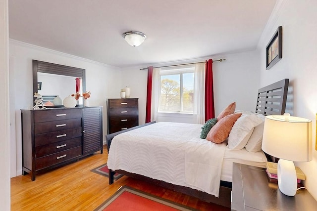 95 Maple St Unit 21, Malden, MA 02148 - bedroom featuring light wood finished floors and ornamental molding