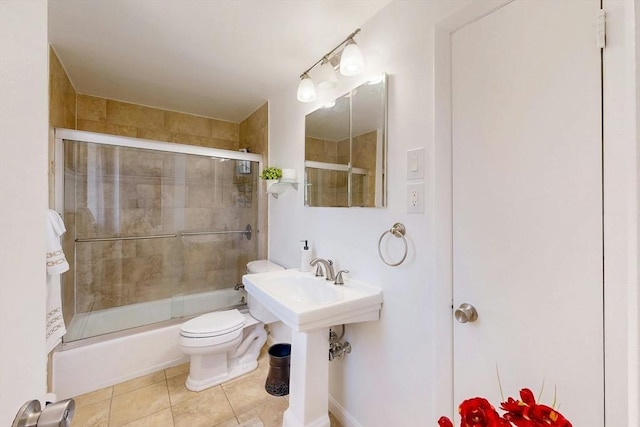 95 Maple St Unit 21, Malden, MA 02148 - full bathroom featuring toilet, tile patterned floors, and enclosed tub / shower combo