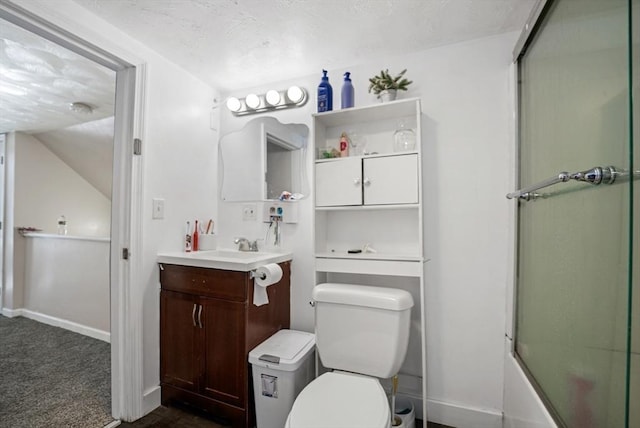 full bathroom with vanity, shower / bath combination with glass door, and toilet