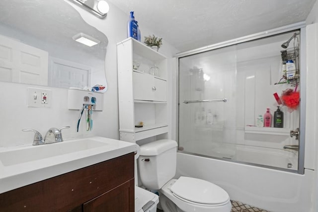 full bathroom with toilet, vanity, and shower / bath combination with glass door