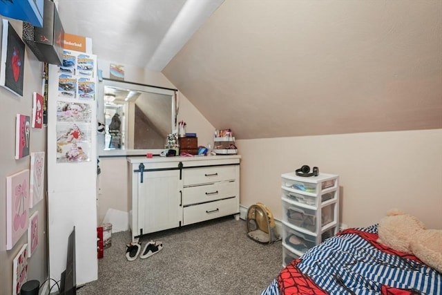 bedroom with lofted ceiling and carpet flooring