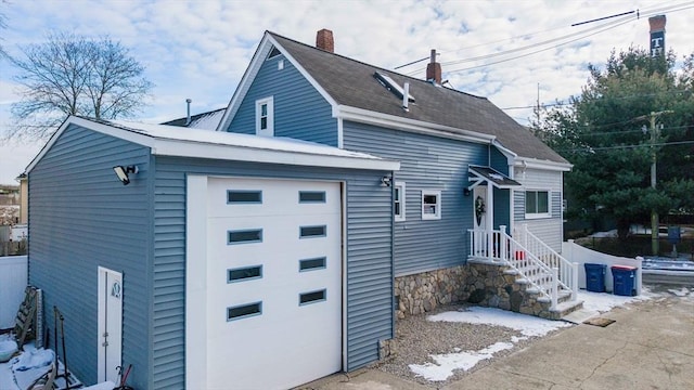 exterior space with a garage