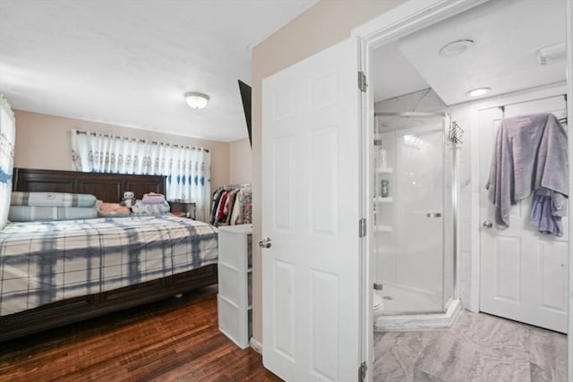 bedroom featuring hardwood / wood-style flooring