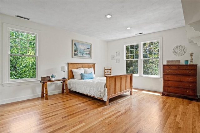 11 Ashford Ln, Andover, MA 01810 - bedroom featuring multiple windows, light wood-style floors, and recessed lighting