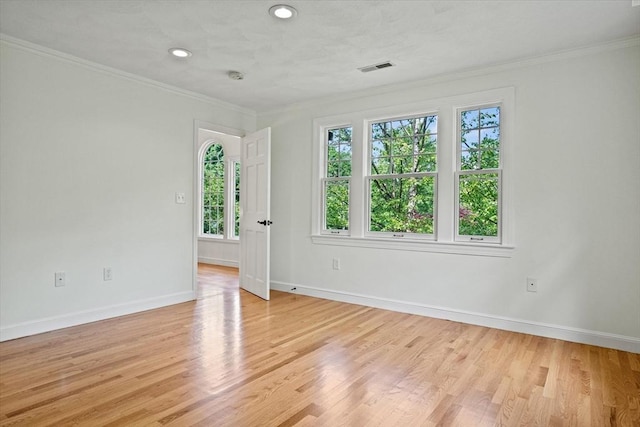 11 Ashford Ln, Andover, MA 01810 - unfurnished room with crown molding, light wood-style floors, and recessed lighting