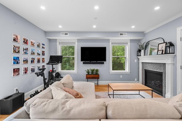 34 Colgate Rd Unit 3, Boston, MA 02131 - living area featuring recessed lighting, wood finished floors, a fireplace, ornamental molding, and baseboards
