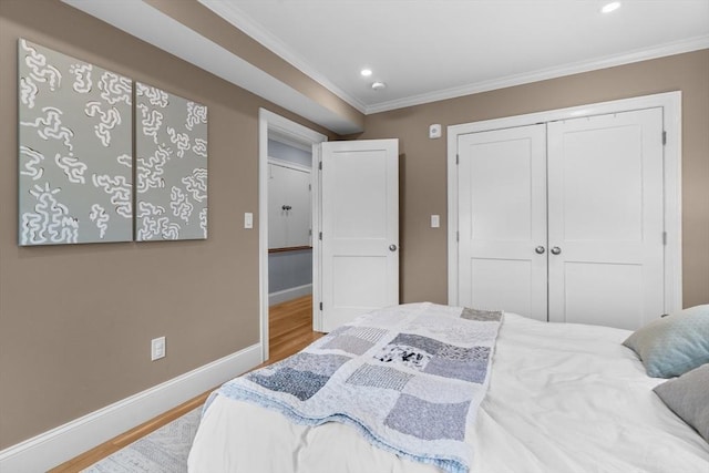 34 Colgate Rd Unit 3, Boston, MA 02131 - bedroom featuring wood finished floors, crown molding, baseboards, a closet, and recessed lighting