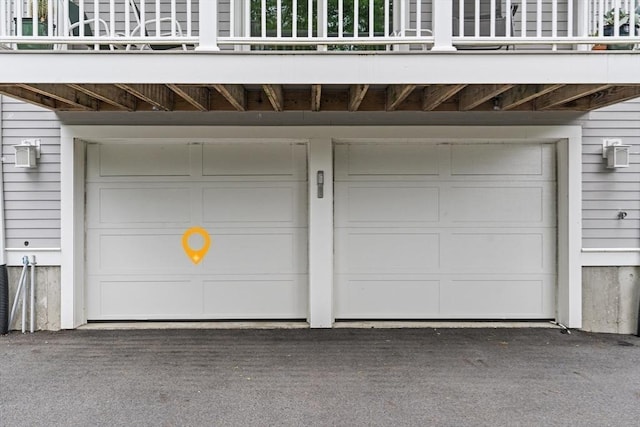 34 Colgate Rd Unit 3, Boston, MA 02131 - garage featuring asphalt driveway