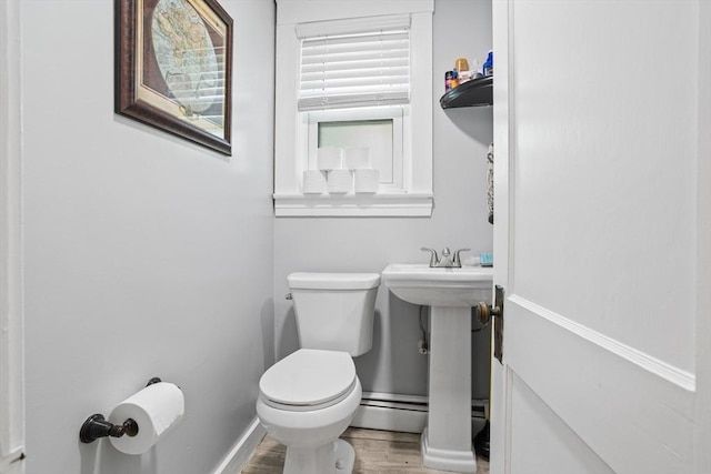 466 Lincoln St, Marlborough, MA 01752 - bathroom with toilet, wood finished floors, and baseboards