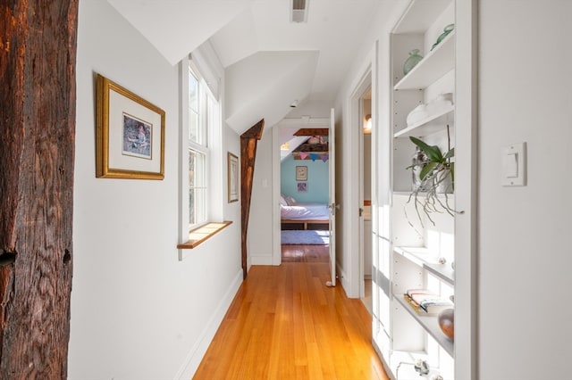 hallway featuring light hardwood / wood-style flooring