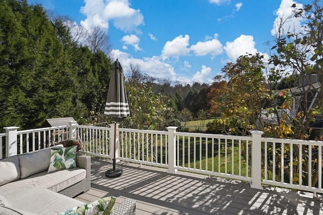 deck featuring outdoor lounge area