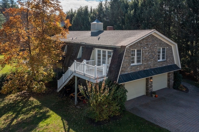 exterior space with a garage